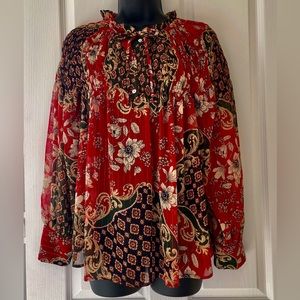 Blouse with ruffle- tied collar